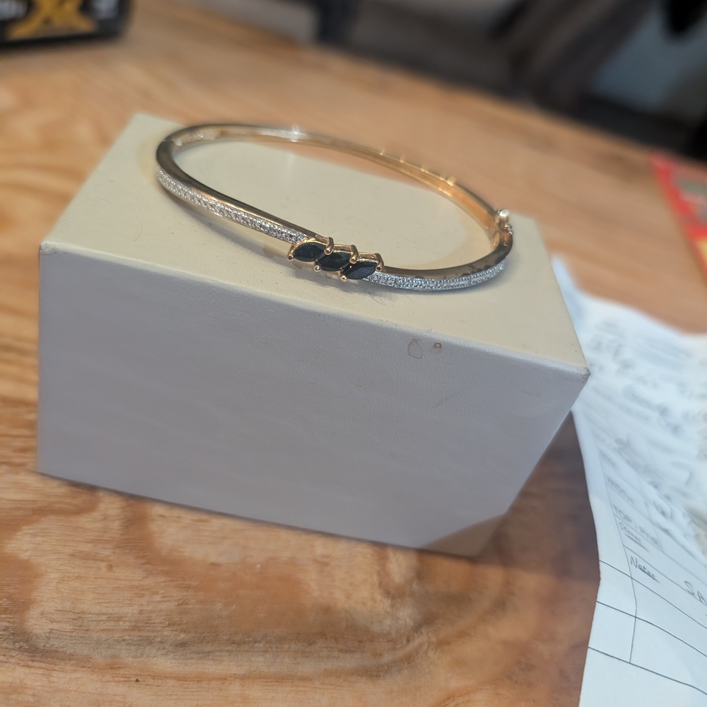 Elegant Gold and Black Bracelet